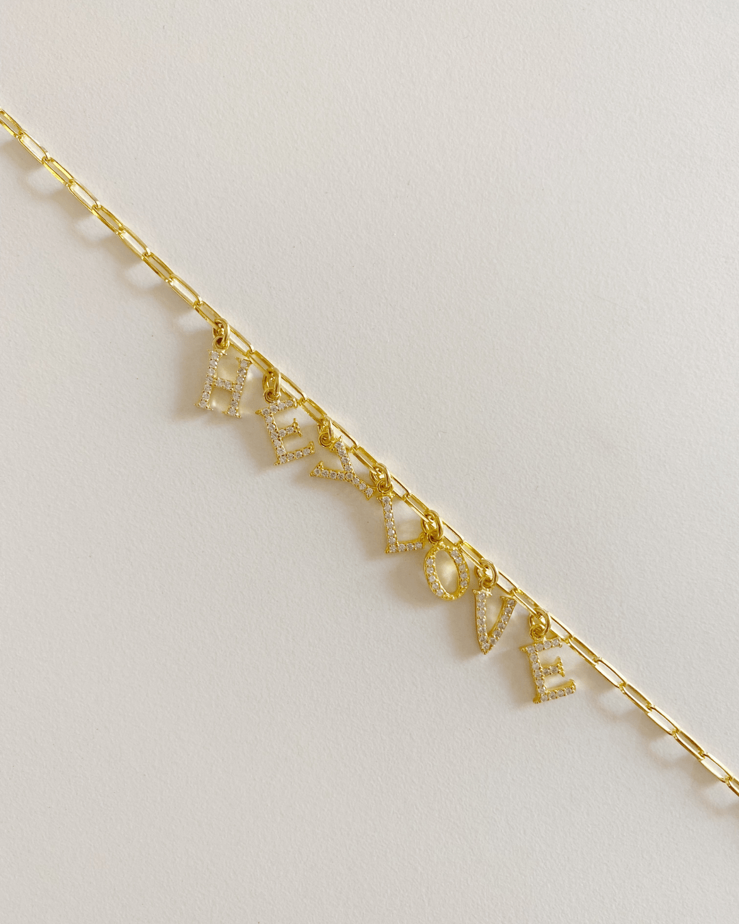 CHARMheyloveInicial circonitas oro | heylove